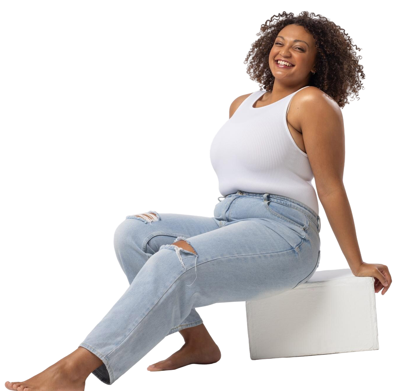 biracial-plus-size-model-sits-smiling-white-background-copy-space 1